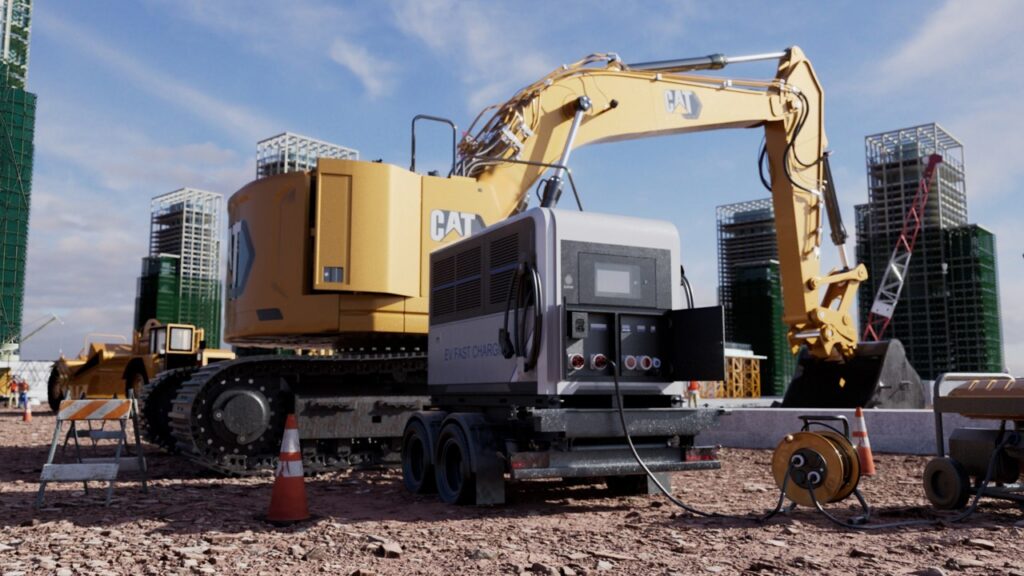 UON DC-FC Mobile trailer-mounted fast charger deployed on a construction site charging a CAT excavator