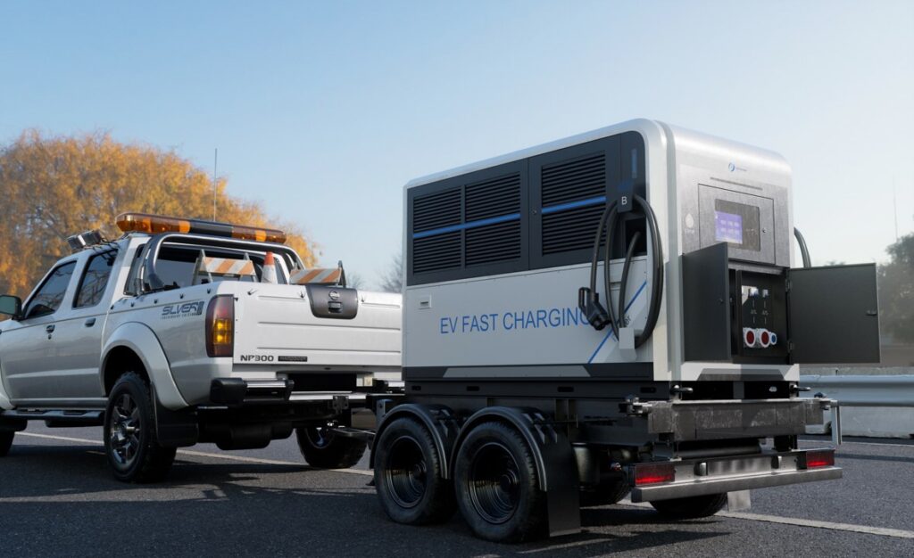 UON DC-FC Mobile trailer-mounted EV fast charger being towed by a Nissan NP300 ute on site